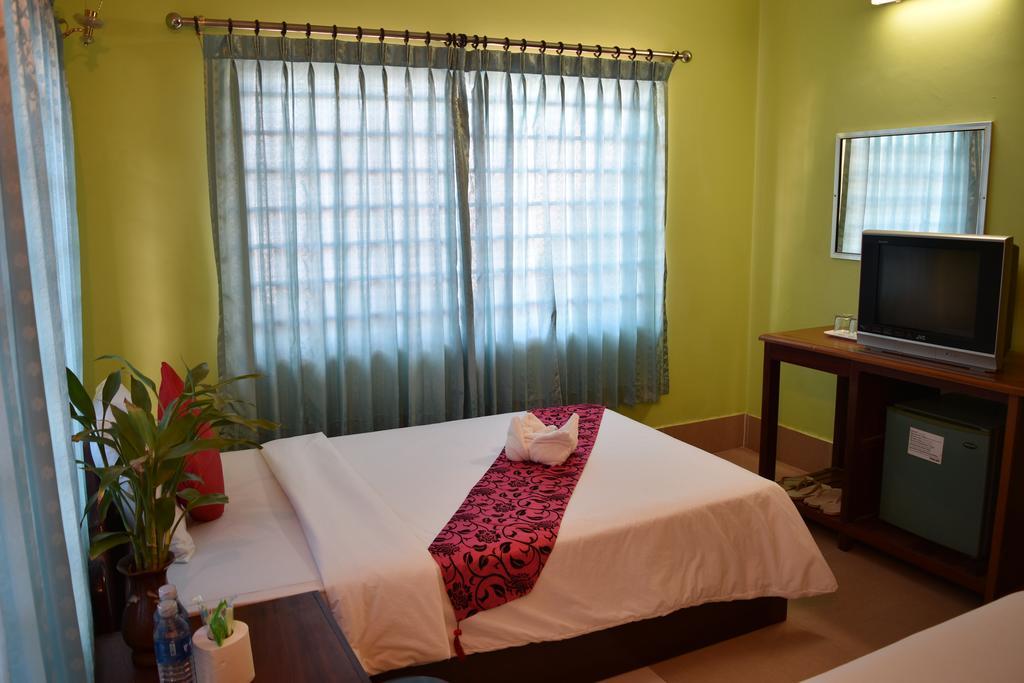 Ta Som Guesthouse & Tour Services Сіємреап Номер фото